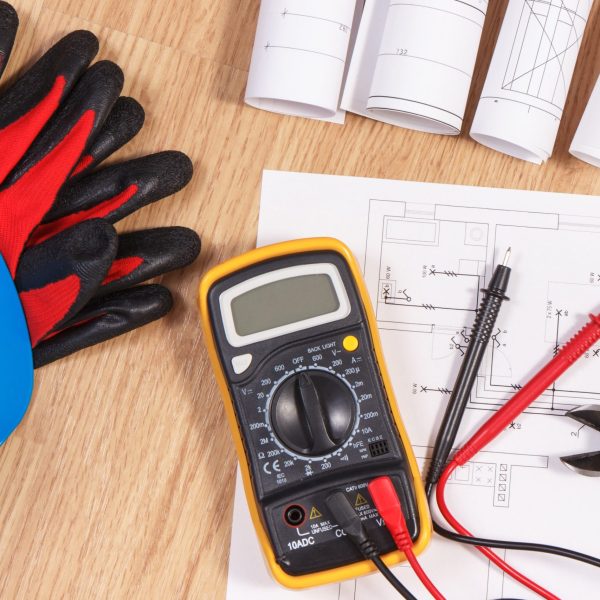 Electrical construction drawings or diagrams, multimeter for measurement in electrical installation and accessories for engineer jobs